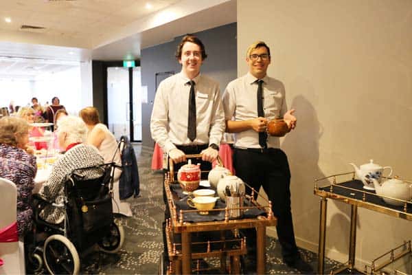 Staff serving tea at a recent High Tea function