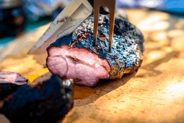 Photo of roast pork being sliced