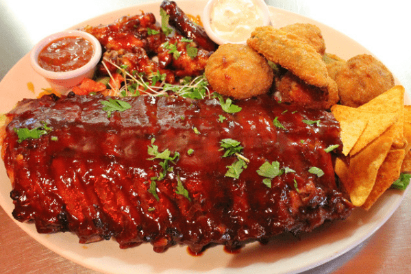 Photo of Texan BBQ, ribs, baby rack, wings platter with nachos