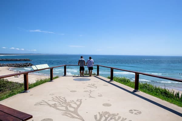 Photo of tourists whale watching from Town Beach Lookout